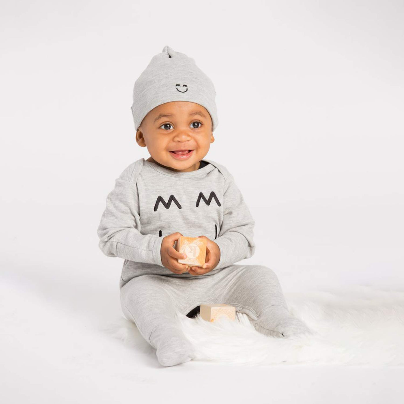 Miles and Milan Knotted Cap, Bodysuit and Romper Cozy Set